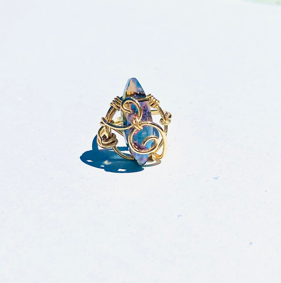 Siren's Wish ring with purple marquise glass stone and swirl band