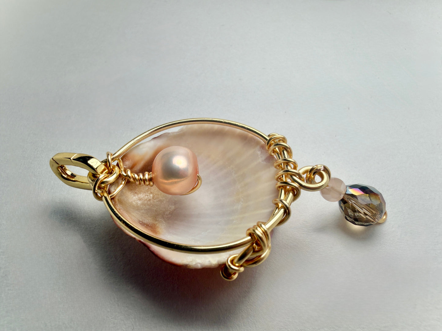 The Rose Tide Charm — Mauve Shell w/ Hidden Pearl & Crystal Drop