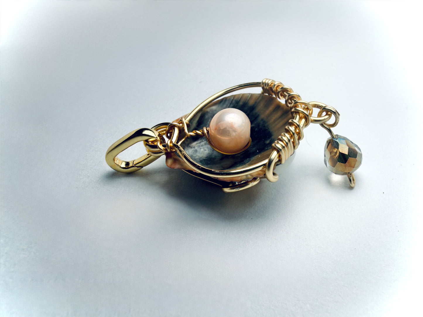 The Moon Tide Charm — Dark Shell w/ Hidden Pearl & Crescent Moon