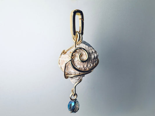 The Tide Caller — Snail Shell Charm w/ Blue Glass Jewel
